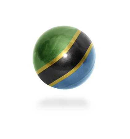 Flag of Tanzania on the ball isolated on whiteの写真素材