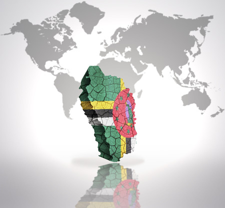 Map of Dominica with Dominican Flag on a world map backgroundの写真素材