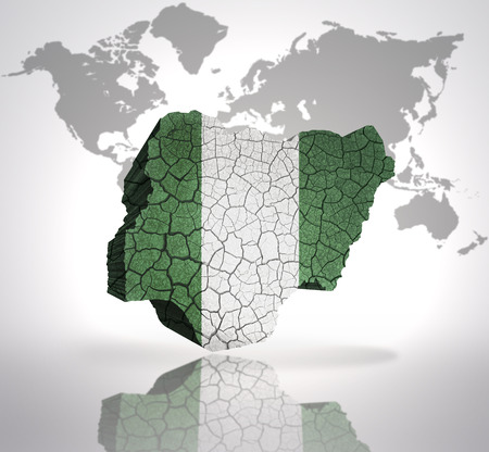 Map of Nigeria  with Nigerian Flag on a world map backgroundの写真素材