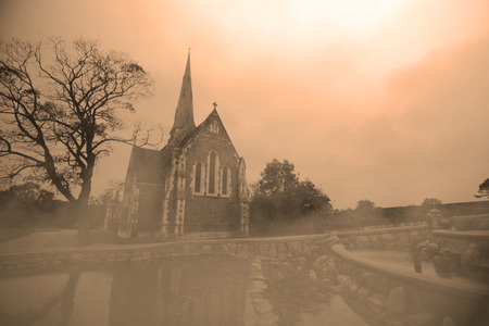 Ancient mystical sinister house in the fogの写真素材