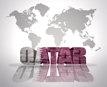 Word Qatar with Qatari Flag on a world map backgroundの写真素材
