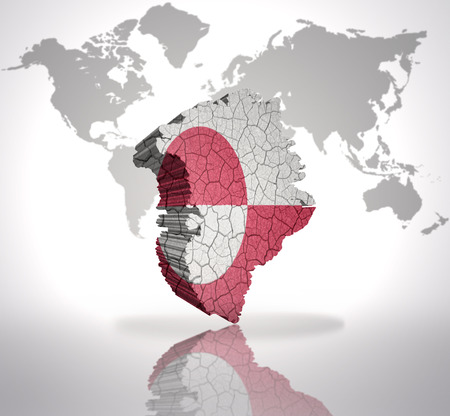 Map of Greenland with Greenlandic Flag on a world map backgroundの写真素材