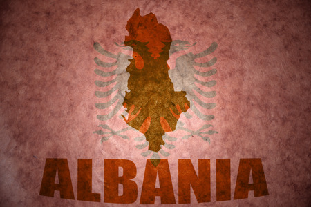albania map on a vintage flag backgroundの写真素材