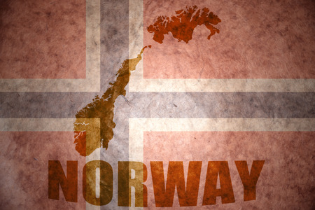 norway map on a vintage norwegian flag backgroundの写真素材