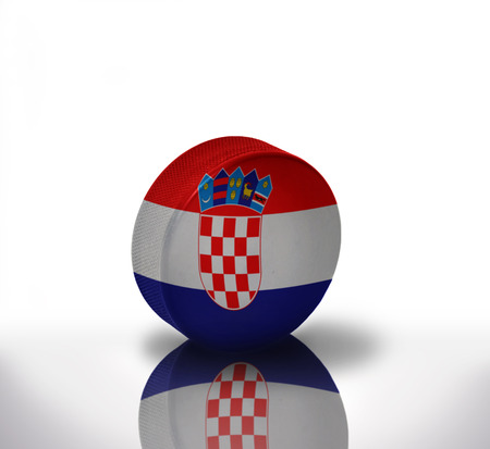 vintage old hockey puck with the croatian flagの写真素材
