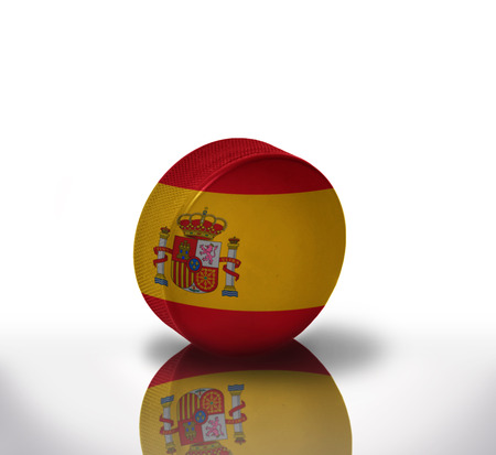 vintage old hockey puck with the spanish flagの写真素材