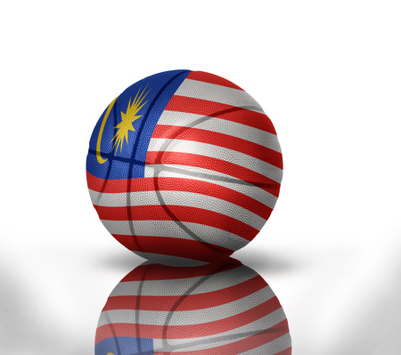 basketball ball with the national flag of malaysia on a white backgroundの写真素材