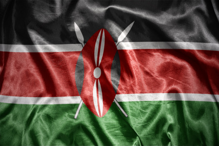 waving and shining kenyan flagの写真素材