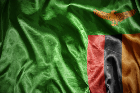 waving and shining zambian flagの写真素材