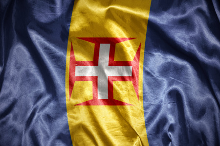 waving and shining madeira flagの写真素材