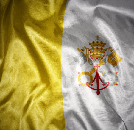 waving and shining vatican flagの写真素材