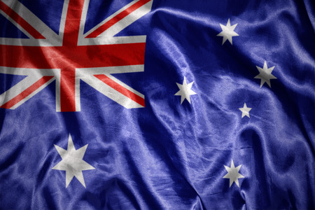 waving and shining australian flagの写真素材