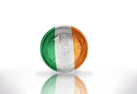 euro coin with irish flag on the white backgroundの写真素材