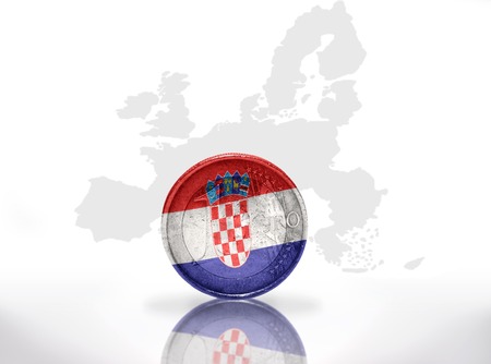 euro coin with croatian flag on the european union map backgroundの写真素材