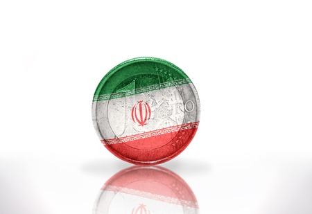 euro coin with iranian flag on the white backgroundの写真素材