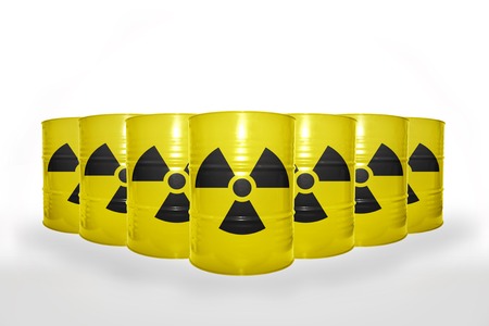 many yellow barrels with sign of radiation on the white background