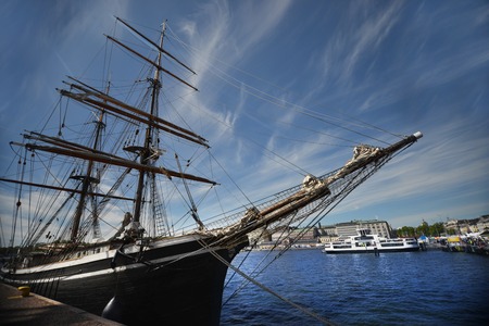 Old ship on the city pierの写真素材