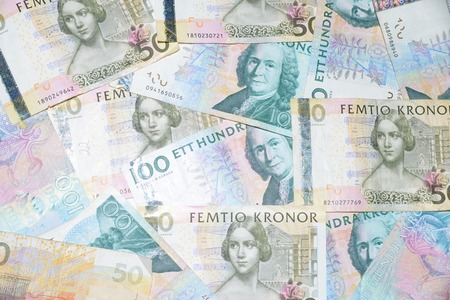 diffirent swedish money on the white backgroundの写真素材