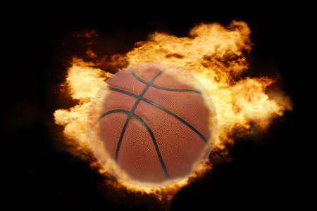 basketball ball on fire on a black backgroundの写真素材