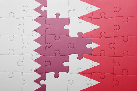 puzzle with the national flag of bahrain and qatarの写真素材