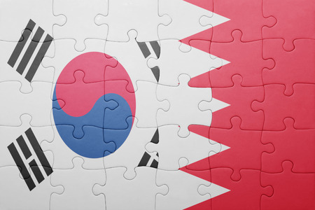 puzzle with the national flag of bahrain and south koreaの写真素材