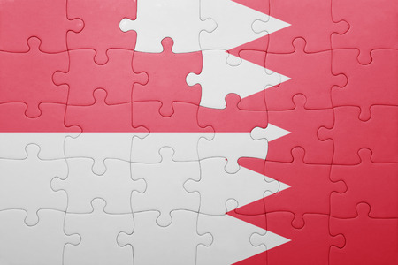 puzzle with the national flag of bahrain and indonesiaの写真素材