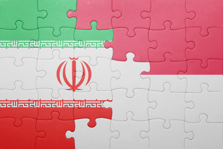 puzzle with the national flag of indonesia and iran . conceptの写真素材