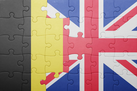 puzzle with the national flag of great britain and belgium . conceptの写真素材