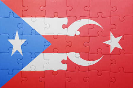 puzzle with the national flag of turkey and puerto rico . conceptの写真素材