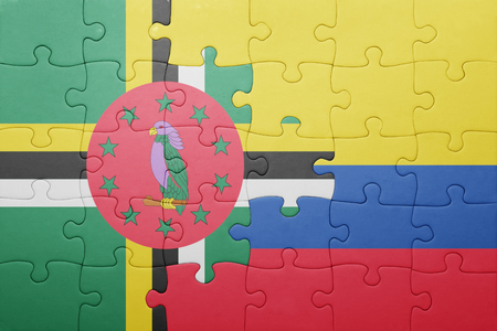 puzzle with the national flag of colombia and dominica . conceptの写真素材