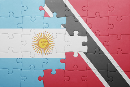 puzzle with the national flag of trinidad and tobago and argentina .conceptの写真素材