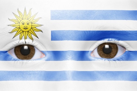 human's face with uruguayan flagの写真素材