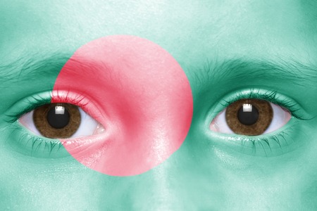 human's face with bangladeshi flagの写真素材