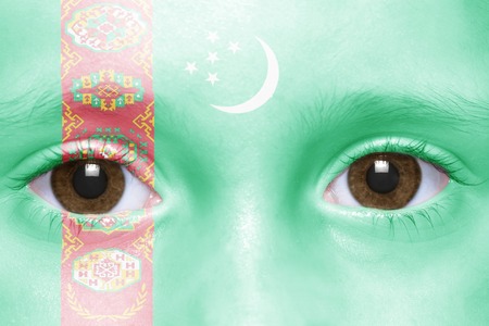 human's face with turkmen flagの写真素材