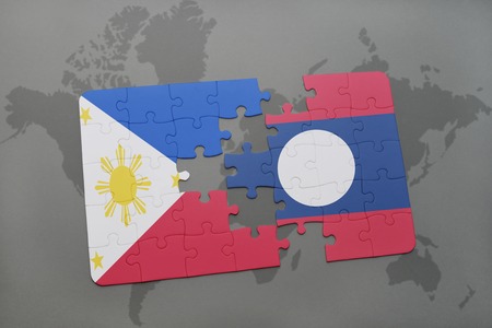 puzzle with the national flag of philippines and laos on a world map background. 3D illustration