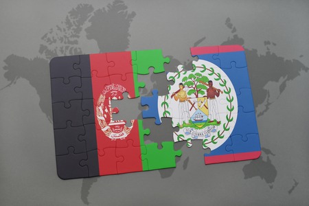 puzzle with the national flag of afghanistan and belize on a world map background. 3D illustrationの写真素材