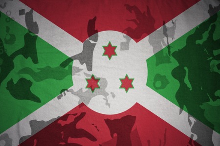 flag of burundi on the khaki texture background. military conceptの写真素材