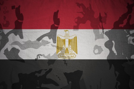 flag of egypt on the khaki texture background. military conceptの写真素材
