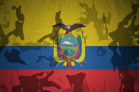 flag of ecuador on the khaki texture background. military conceptの写真素材