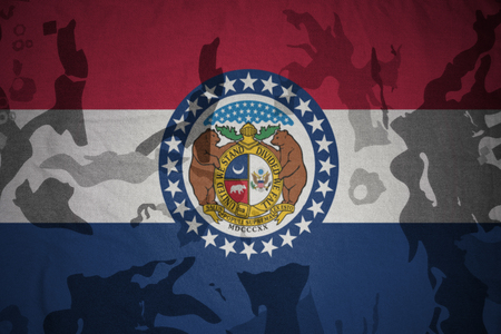 missouri state flag on the khaki texture background. military conceptの写真素材