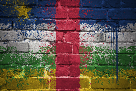 colorful painted national flag of central african republic on a old brick wallの写真素材