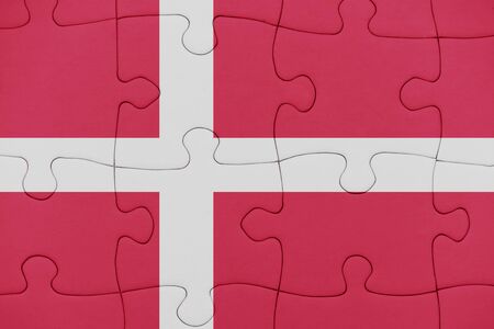 puzzle with the national flag of denmark. conceptの写真素材