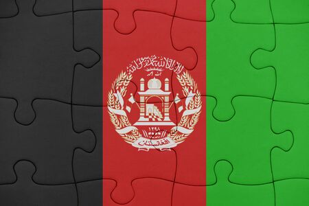 puzzle with the national flag of afghanistan. conceptの写真素材