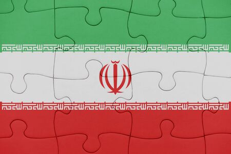 puzzle with the national flag of iran. concept