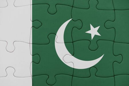 puzzle with the national flag of pakistan. conceptの写真素材