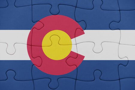 puzzle with the flag of colorado state. conceptの写真素材