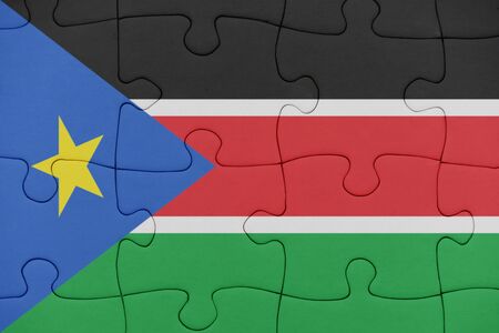 puzzle with the national flag of south sudan. conceptの写真素材