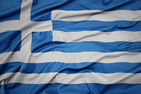 waving colorful national flag of greece. macro shot
