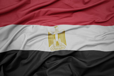 waving colorful national flag of egypt . macro shot