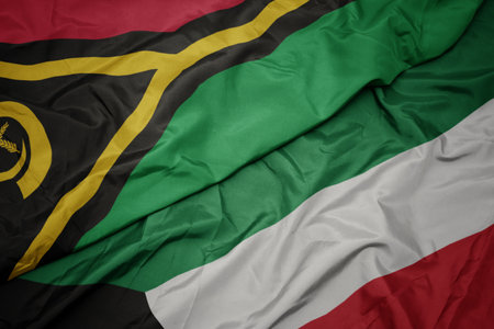 waving colorful flag of kuwait and national flag of Vanuatu . macro